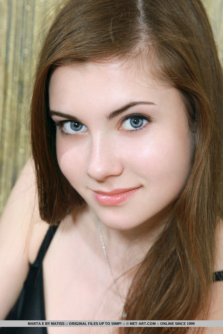 marta-big-tits-performs-a-striptease-01