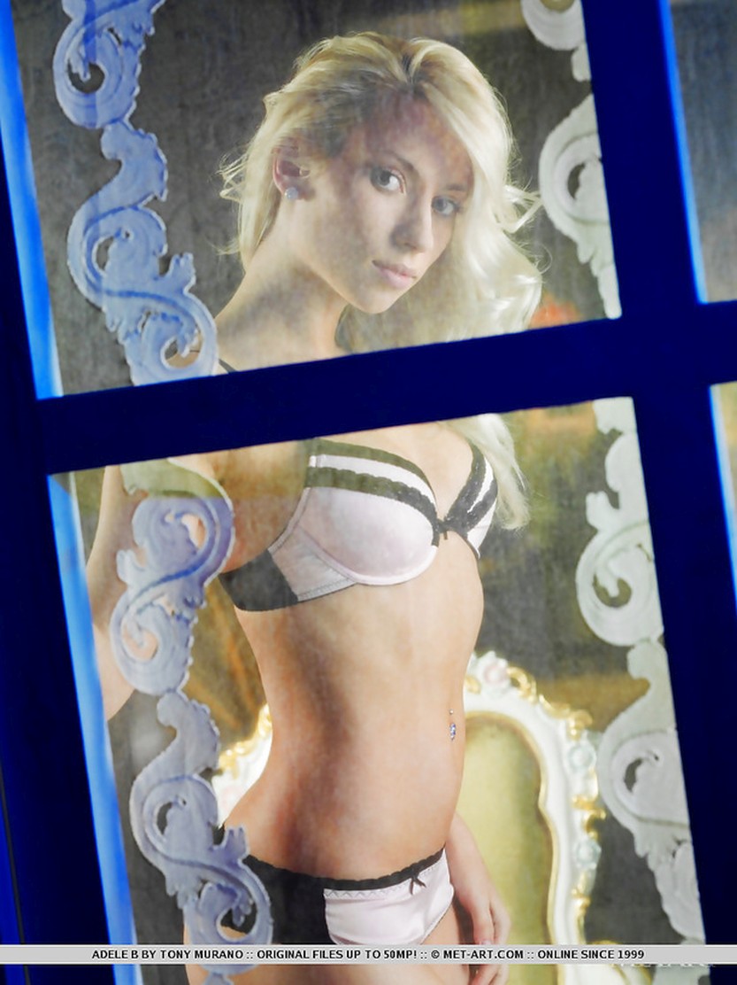 adele-b-curly-blond-hair-does-a-striptease-03