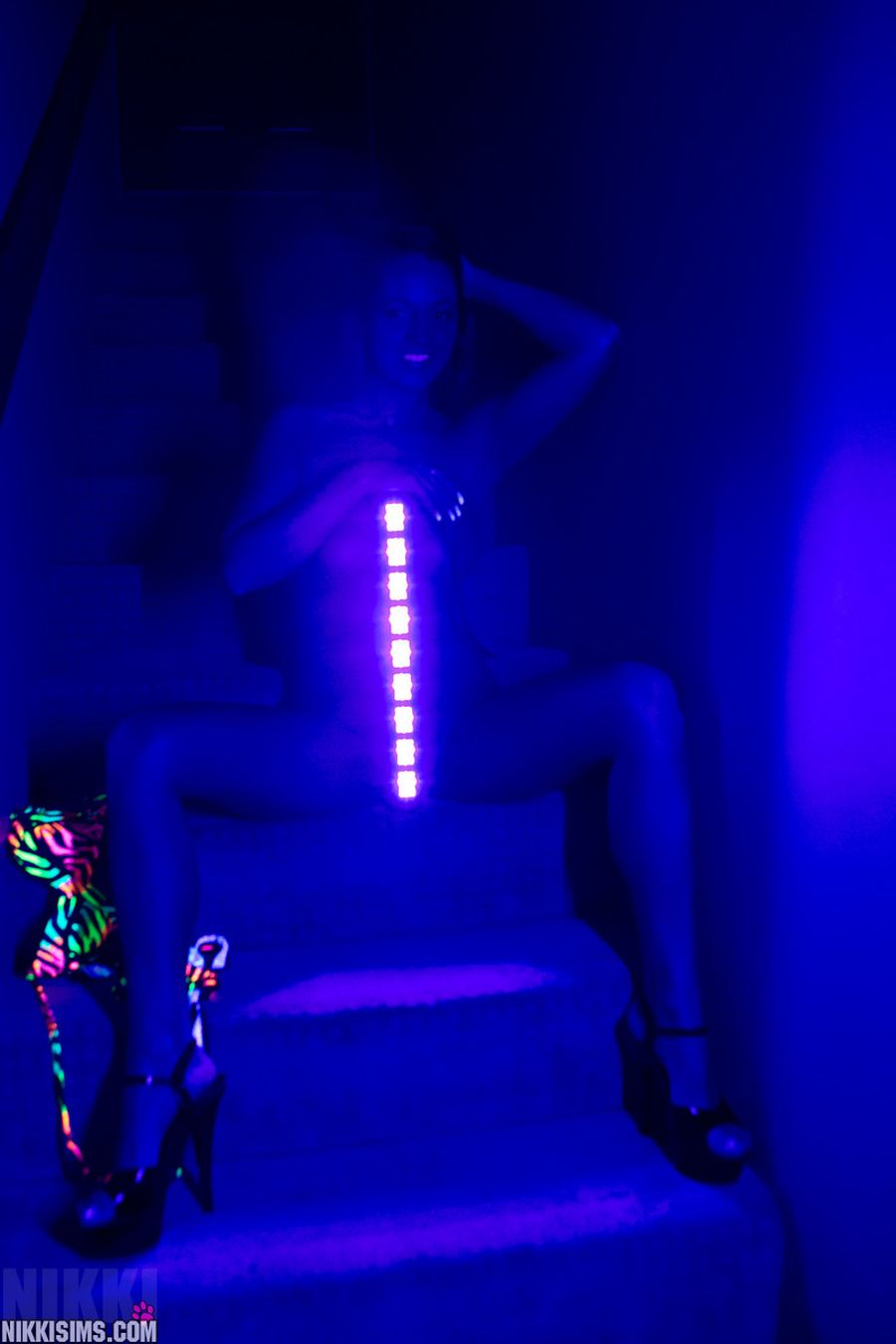 Nikki Sims sexy in blacklight 15